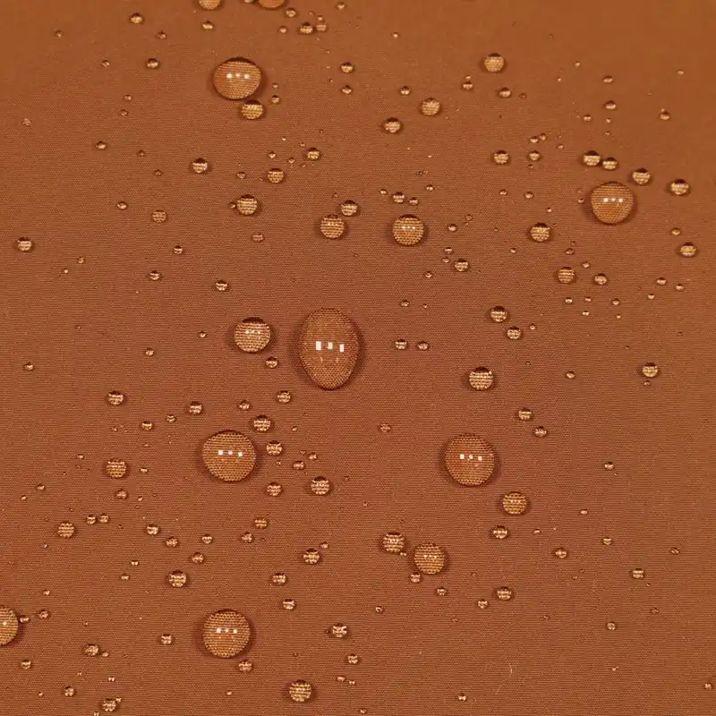 Ab Werk Jackenstoff mit Lotuseffekt uni - rostbraun